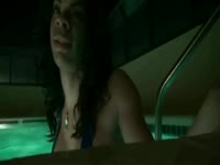 Large breasted shemale beauty Sasha Strokes has fun teasing in a tiny bikini while in the pool